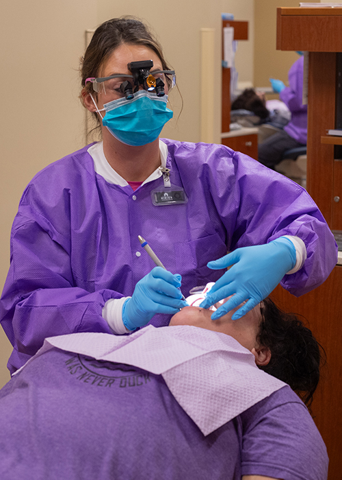 Dental student in the dental clinic